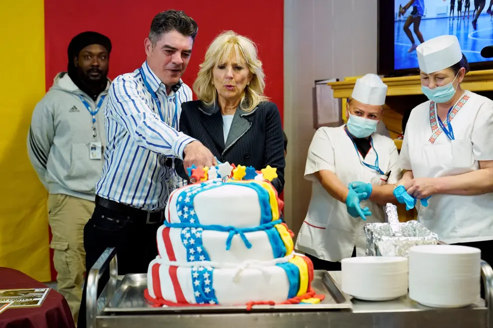 First lady Jill Biden serves meals to U.S. troops during a visit to the Mihail Kogalniceanu Air Base in Romania, Friday, May 6, 2022. Susan Walsh/Pool via REUTERS UKRAINE-CRISIS/JILL BIDEN