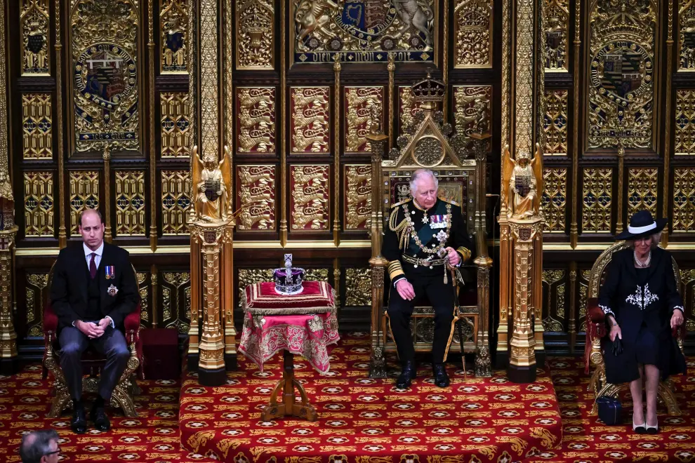 Britain's Prince Charles and Camilla, Duchess of Cornwall, follow behind the Imperial State Crown during the State Opening of Parliament in the House of Lords Chamber in the Houses of Parliament in London, Britain, May 10, 2022. Ben Stansall/Pool via REUTERS BRITAIN-POLITICS/PARLIAMENT