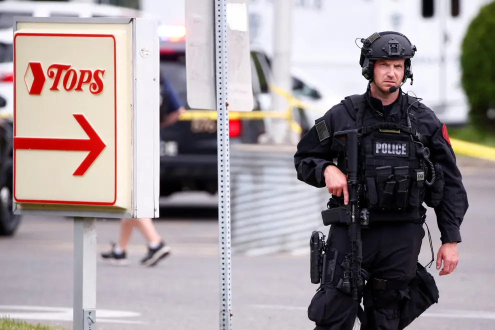 A man who was later taken into custody following a mass shooting arrives in the parking lot of TOPS supermarket, with what appear to be weapons leaning on the passenger seat, in a still image from a livestream video in Buffalo, New York, U.S. May 14, 2022.  Social Media via REUTERS THIS IMAGE HAS BEEN SUPPLIED BY A THIRD PARTY. IT IS DISTRIBUTED, EXACTLY AS RECEIVED BY REUTERS, AS A SERVICE TO CLIENTS NEW YORK-SHOOTING/