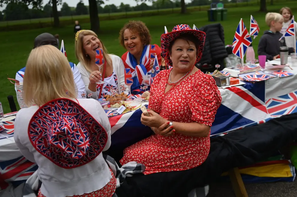 A reveller attends a Jubilee-themed community street lunch as the Queen's Platinum Jubilee celebrations continue in Cookham, Britain, June 5, 2022. REUTERS/Toby Melville BRITAIN-ROYALS/PLATINUM-JUBILEE