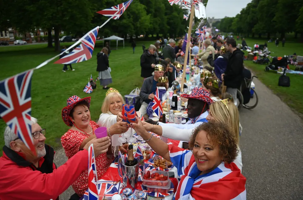 A reveller attends a Jubilee-themed community street lunch as the Queen's Platinum Jubilee celebrations continue in Cookham, Britain, June 5, 2022. REUTERS/Toby Melville BRITAIN-ROYALS/PLATINUM-JUBILEE