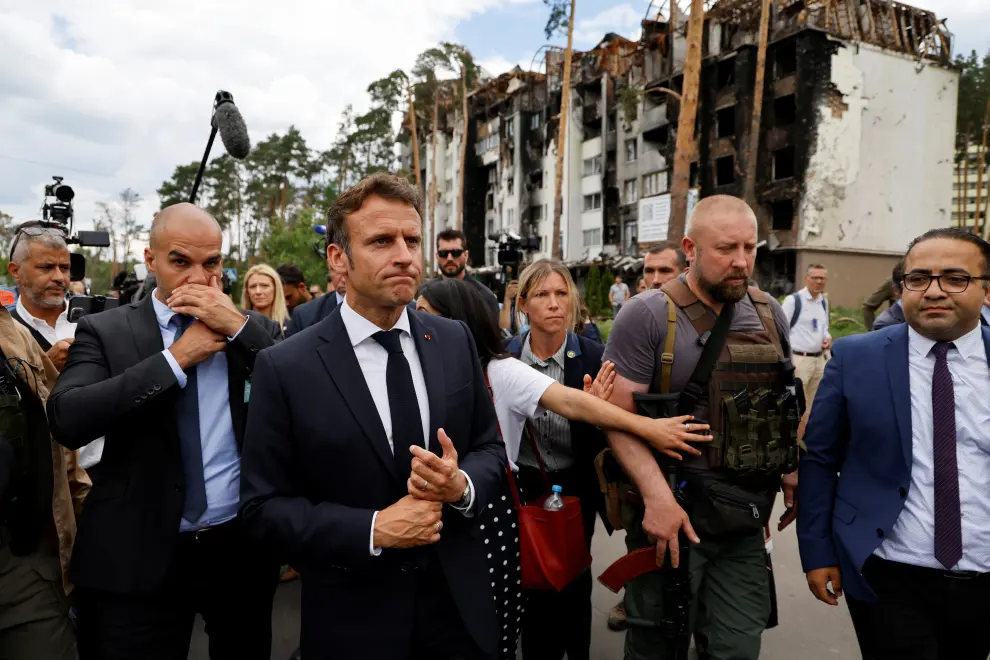 France's President Emmanuel Macron flanked by France's Foreign Affairs Minister Catherine Colonna  visit Irpin, Ukraine June 16, 2022. Ludovic Marin/Pool via REUTERS UKRAINE-CRISIS/EU-LEADERS