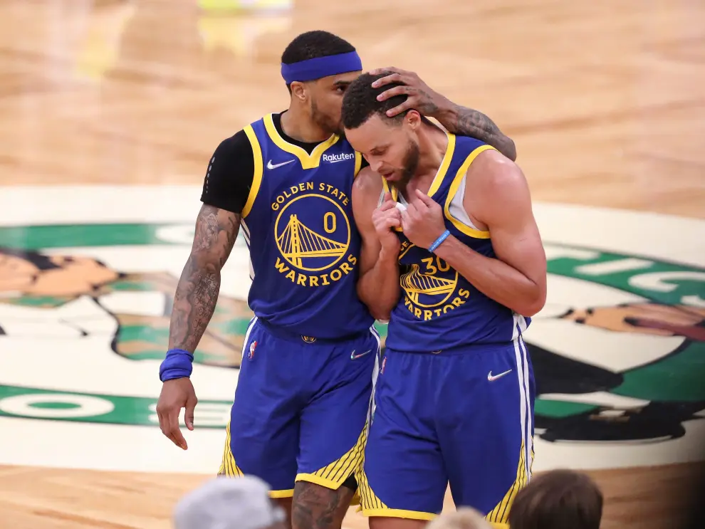 Jun 16, 2022; Boston, Massachusetts, USA; Golden State Warriors forward Andre Iguodala (9) celebrates with guard Stephen Curry (30) after they beat the Boston Celtics in game six of the 2022 NBA Finals to win the NBA champinship at TD Garden. Mandatory Credit: Bob DeChiara-USA TODAY Sports BASKETBALL-NBA-BOS-GSW/