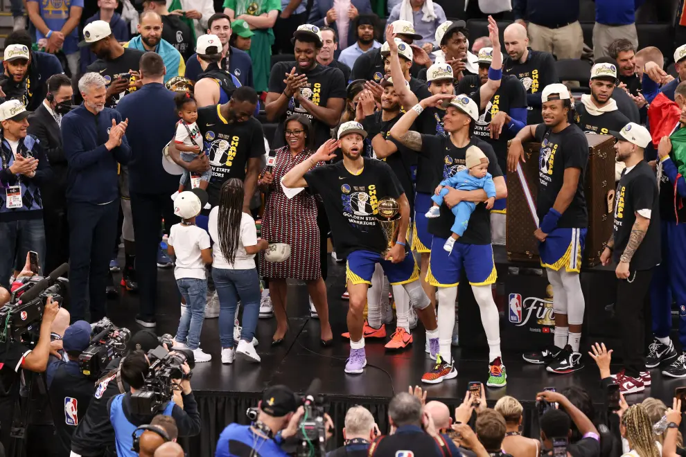Jun 16, 2022; Boston, Massachusetts, USA; Golden State Warriors guard Stephen Curry (30) holds up the Larry O'Brien Trophy after defeating the Boston Celtics in game six of the 2022 NBA Finals at TD Garden. Mandatory Credit: Paul Rutherford-USA TODAY Sports BASKETBALL-NBA-BOS-GSW/