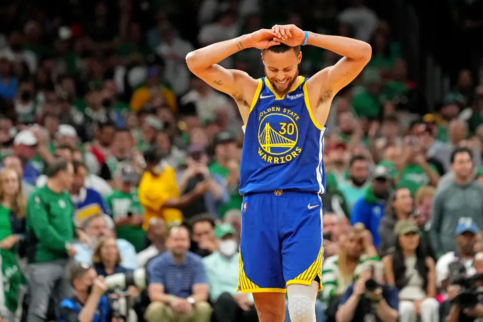 Jun 16, 2022; Boston, Massachusetts, USA; Golden State Warriors guard Stephen Curry (30) reacts after winning the Most Valuable Player  award after defeating the against the Boston Celtics in game six in the 2022 NBA Finals at the TD Garden. Mandatory Credit: Paul Rutherford-USA TODAY Sports BASKETBALL-NBA-BOS-GSW/
