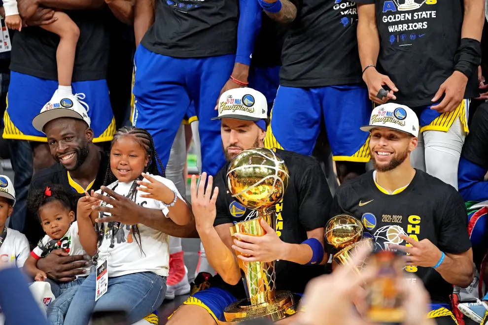 Jun 16, 2022; Boston, Massachusetts, USA; Golden State Warriors guard Stephen Curry (30) celebrates with the MVP trophy after the Golden State Warriors beat the Boston Celtics in game six of the 2022 NBA Finals to win the NBA Championship at TD Garden. Mandatory Credit: Kyle Terada-USA TODAY Sports BASKETBALL-NBA-BOS-GSW/