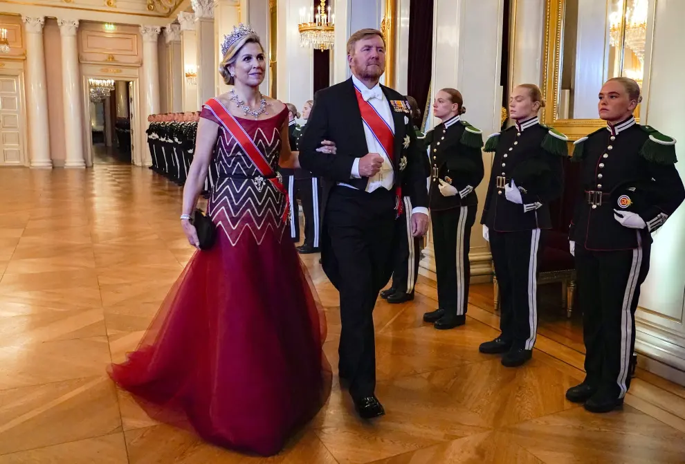 Princess Elisabeth and Queen Mathilde of Belgium walk through The Great Hall before entering the gala dinner for Norway's Princess Ingrid Alexandra's 18th birthday celebration at the Royal Palace in Oslo, Norway, June 17, 2022. NTB/Lise Aaserud via REUTERS   ATTENTION EDITORS - THIS IMAGE WAS PROVIDED BY A THIRD PARTY. NORWAY OUT. NO COMMERCIAL OR EDITORIAL SALES IN NORWAY. NORWAY-ROYALS/