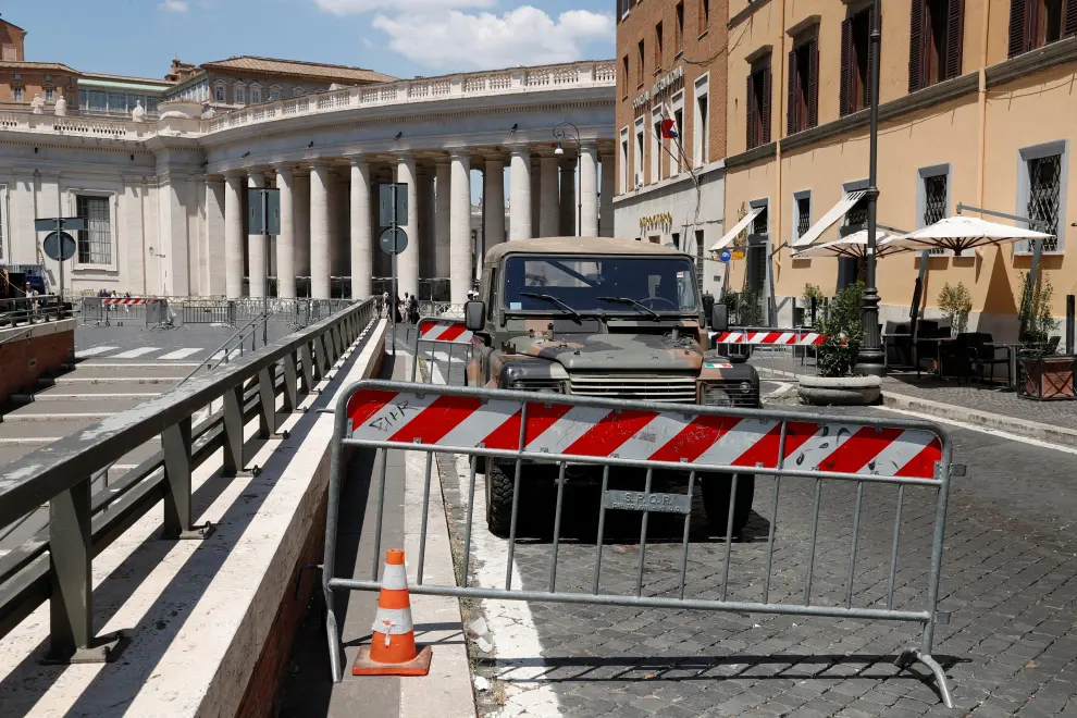 Soldiers stand guard at the scene near Vatican City after a car did not stop at the halt and broke through Vatican barriers in Rome, Italy, June 19, 2022. REUTERS/Remo Casilli ITALY-POLICE/CAR
