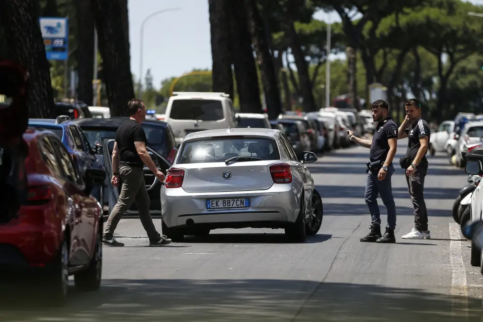 People walk along the Via della Conciliazione, outside the Vatican after a car did not stop at the halt and broke through barriers near the the Vatican City,  June 19, 2022. REUTERS/Remo Casilli ITALY-POLICE/CAR