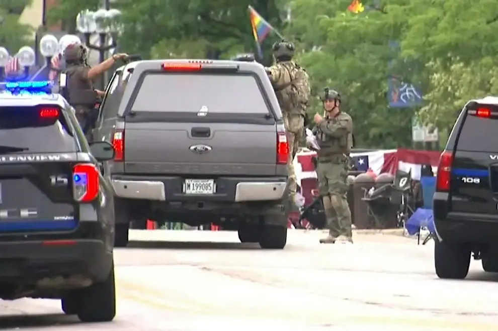Folding chairs are left after gunfire erupted at a Fourth of July parade route in the wealthy Chicago suburb of Highland Park, Illinois, U.S. July 4, 2022 in a still image from video. ABC affiliate WLS/ABC7 via REUTERS     NO RESALES. NO ARCHIVES. MANDATORY CREDIT USA-JULYFOURTH/SHOOTING