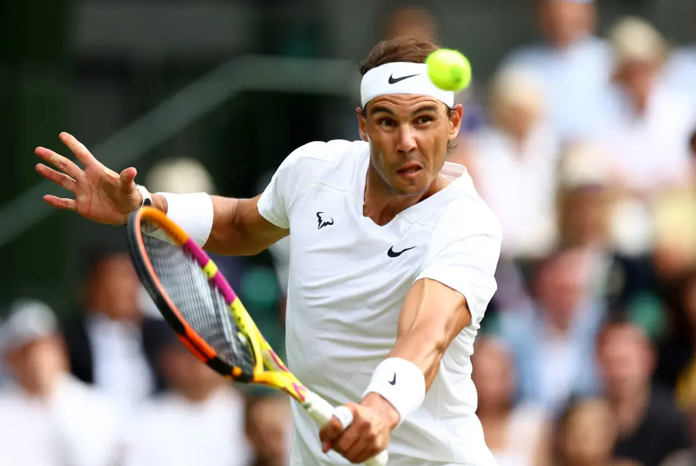 Tennis - Wimbledon - All England Lawn Tennis and Croquet Club, London, Britain - July 6, 2022  Spain's Rafael Nadal reacts during his quarter final match against Taylor Fritz of the U.S. REUTERS/Hannah Mckay TENNIS-WIMBLEDON/