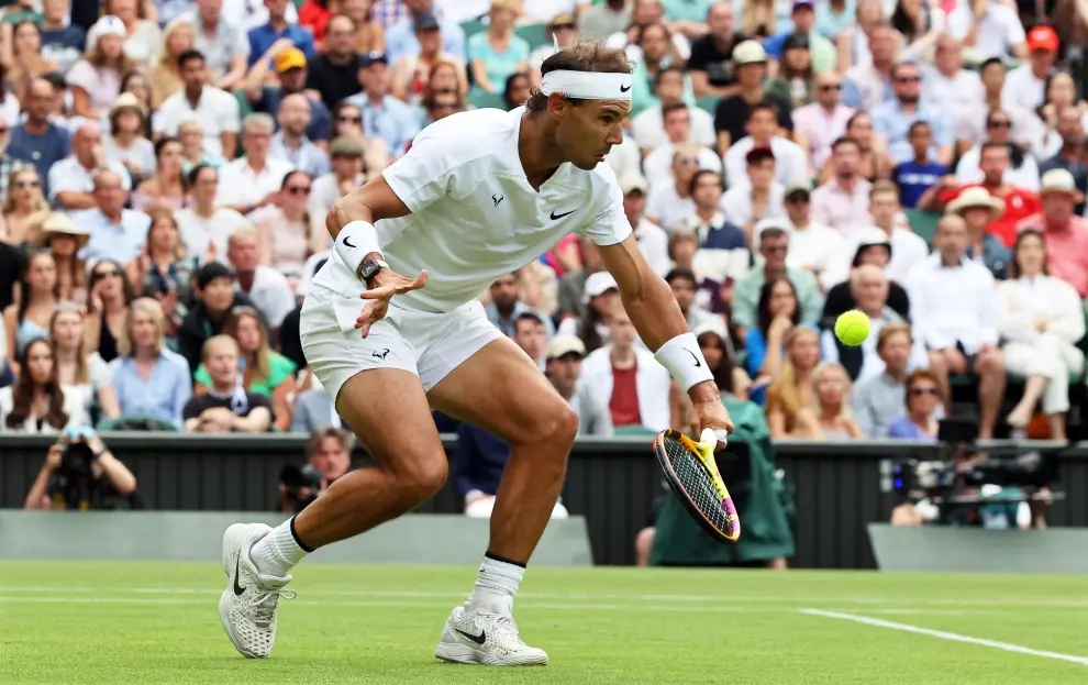 Tennis - Wimbledon - All England Lawn Tennis and Croquet Club, London, Britain - July 6, 2022  Taylor Fritz of the U.S. in action during his quarter final match against Spain's Rafael Nadal REUTERS/Hannah Mckay TENNIS-WIMBLEDON/