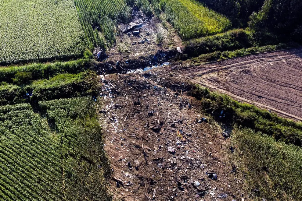 Debris burns at the crash site of an Antonov An-12 cargo plane owned by a Ukrainian company, near Kavala, Greece, July 17, 2022. REUTERS/Alkis Konstantinidis GREECE-AIRCRAFT/CRASH