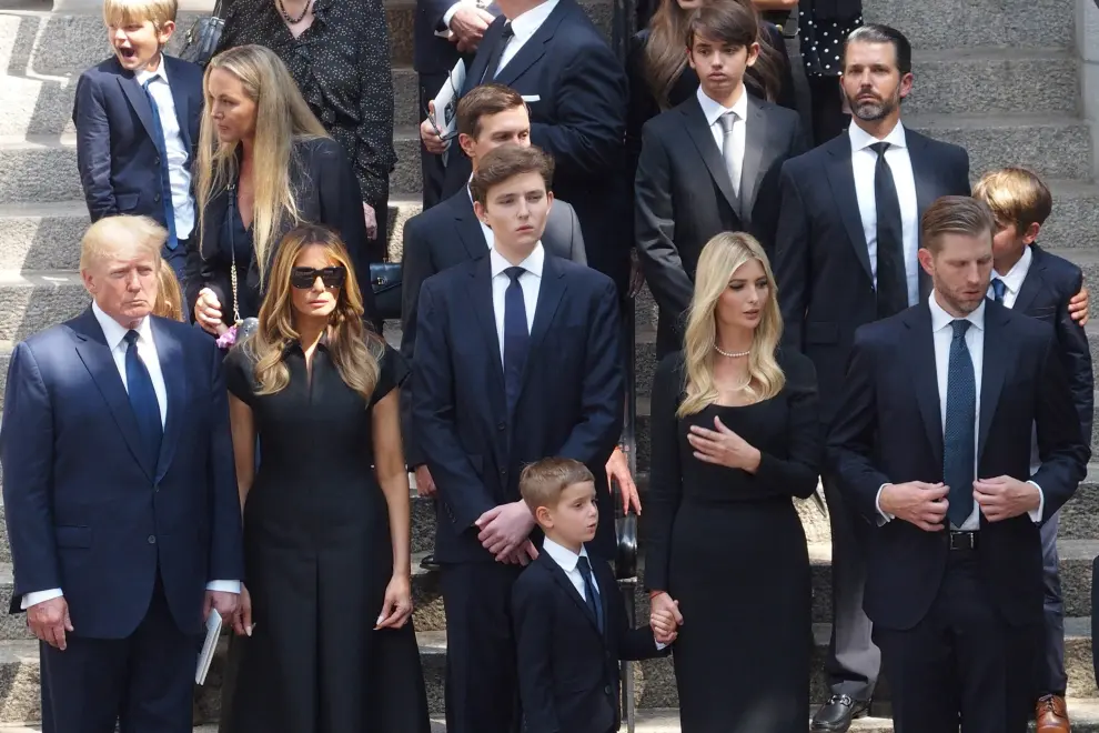 Former U.S. President Donald Trump with his wife Melania, daughter Ivanka and son Donald Jr. attend the funeral for Ivana Trump, socialite and his first wife, in New York City, U.S., July 20, 2022. REUTERS/Jeenah Moon PEOPLE-IVANA TRUMP/FUNERAL