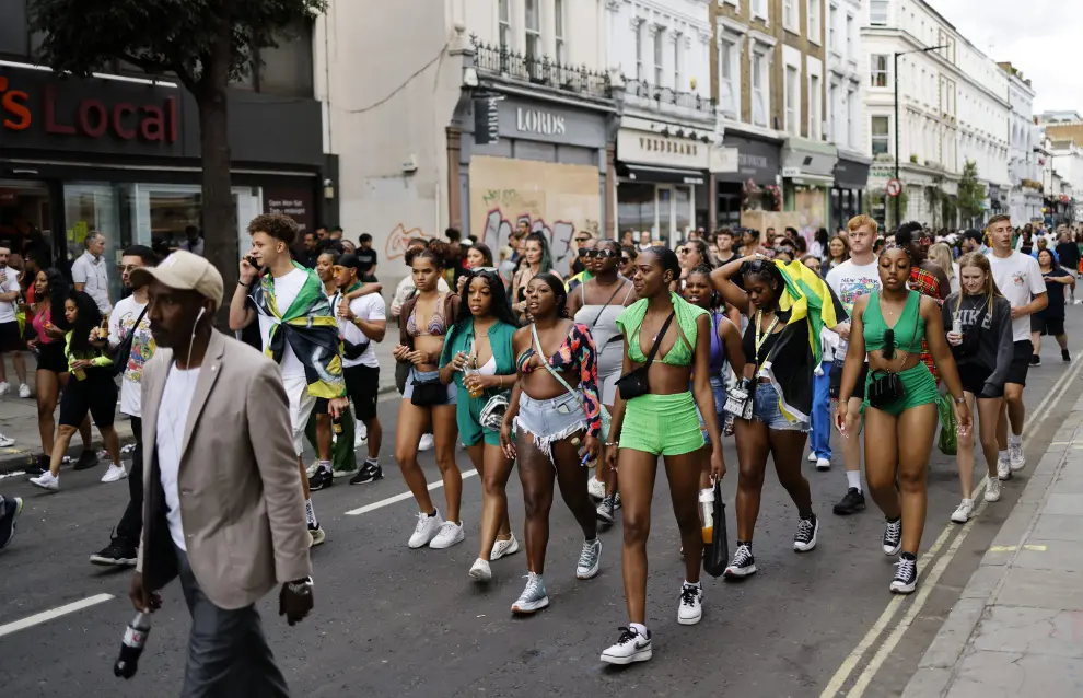 London (United Kingdom), 29/08/2022.- Participants perform during the Notting Hill Carnival in London, Britain, 29 August 2022. The Notting Hill Carnival is the largest street carnival in Europe returned to London after two year break due to the coronavirus pandemic with more than a million people expected to attend the two-day celebration of Caribbean heritage on 28 and 29 August. (Reino Unido, Londres) EFE/EPA/Tolga Akmen
 BRITAIN TRADITIONS CARNIVAL