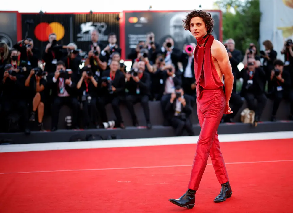 The 79th Venice Film Festival - Premiere screening of the film "Bones and All" in competition - Red Carpet Arrivals - Venice, Italy, September 2, 2022. Cast members Taylor Russell and Timothee Chalamet attend. REUTERS/Guglielmo Mangiapane FILMFESTIVAL-VENICE/BONES AND ALL