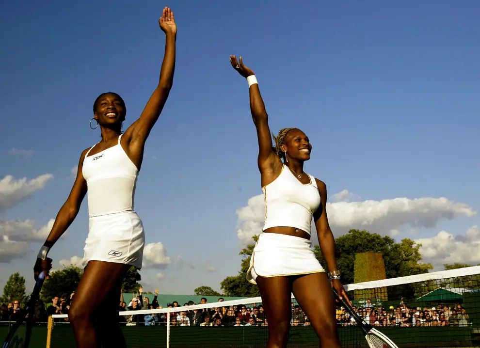 FILE PHOTO: Serena Williams of the U.S. returns to Belgium's Els Callens in their third round match at the Wimbledon tennis championships, June 28, 2002. REUTERS/Jeff J Mitchell/File Photo TENNIS-USOPEN/SERENA