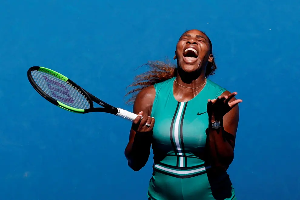 FILE PHOTO: Serena Williams of the U.S. celebrates after defeating Zheng Jie of China in their women's singles tennis match at the Wimbledon tennis championships in London June 30, 2012. REUTERS/Stefan Wermuth/File Photo TENNIS-USOPEN/SERENA