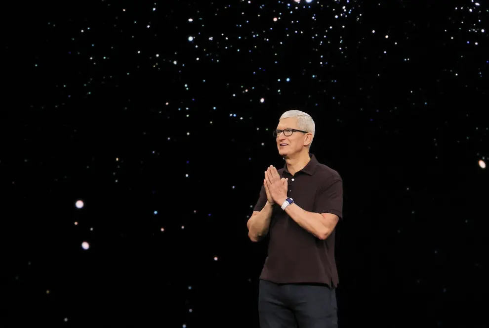 Apple CEO Tim Cook presents the new iPhone 14 at an Apple event at their headquarters in Cupertino, California, U.S. September 7, 2022. REUTERS/Carlos Barria APPLE-EVENT/