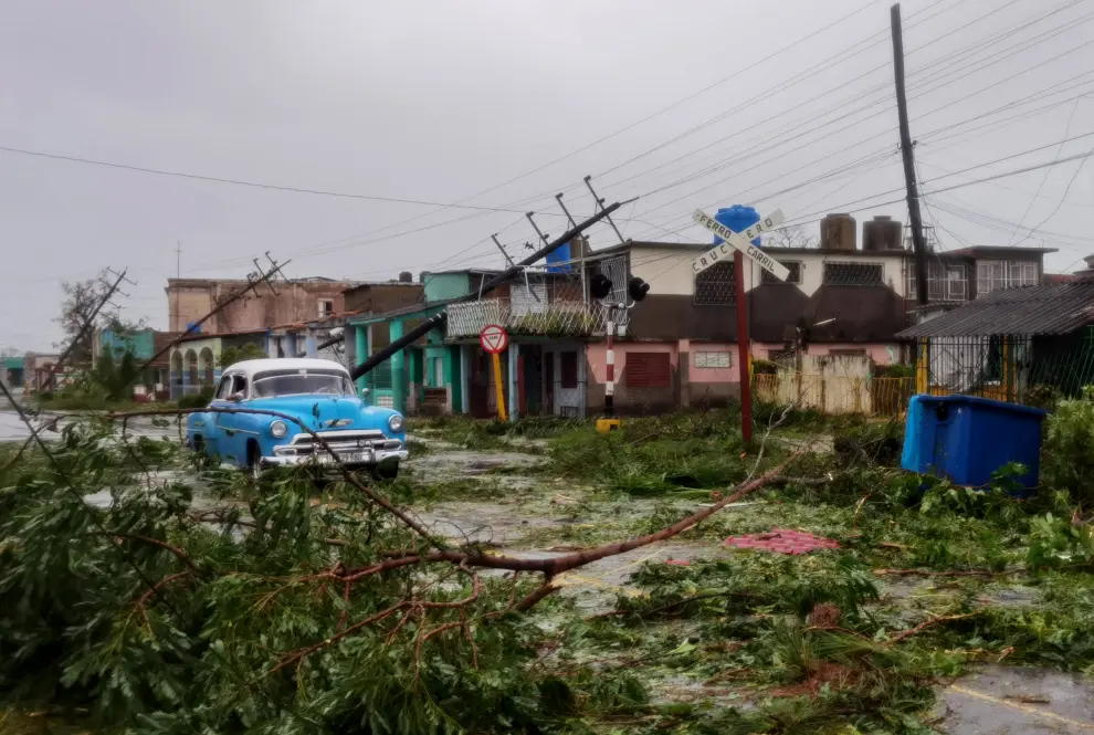A downed pole is seen on the street in the aftermath of Hurricane Ian's passage through Pinar del Rio, Cuba, September 27, 2022. REUTERS/Alexandre Meneghini STORM-IAN/CUBA
