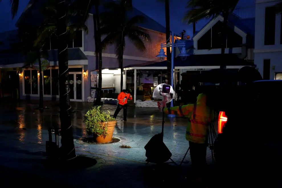 A view of trees swaying during heavy rain, due to Hurricane Ian, in Key West, Florida, U.S., September 27, 2022, in this still image taken from a social media video. Victoria Bollea/via REUTERS  THIS IMAGE HAS BEEN SUPPLIED BY A THIRD PARTY. MANDATORY CREDIT. NO RESALES. NO ARCHIVES. STORM-IAN/FLORIDA