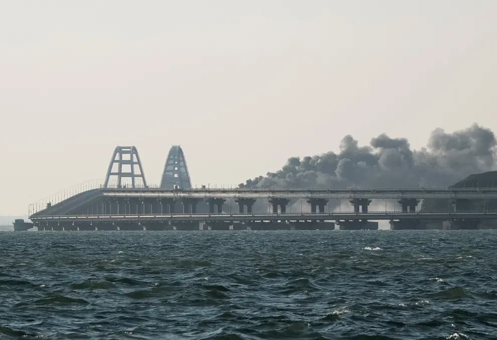 Smoke rises from fire on the Kerch bridge in the Kerch Strait, Crimea