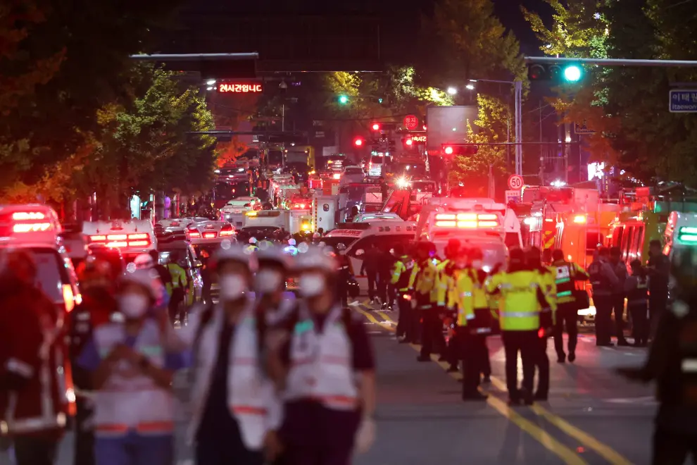 Rescue team and firefighters work at the scene where dozens of people were injured in a stampede during a Halloween festival in Seoul, South Korea, October 29, 2022. REUTERS/Kim Hong-ji SOUTHKOREA-STAMPEDE/