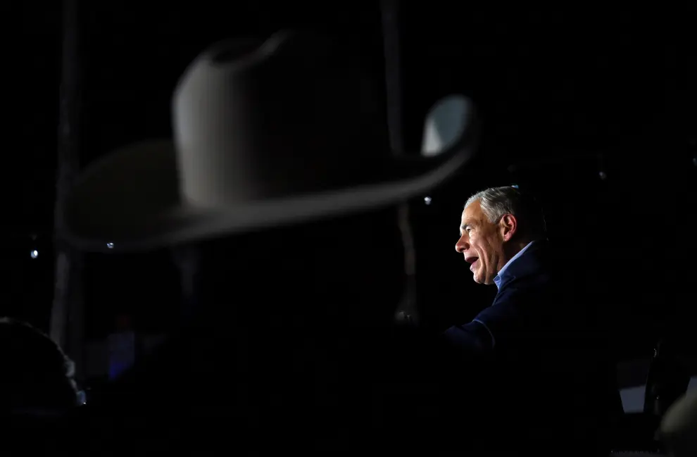 Republican Governor Greg Abbott looks on as he attends his 2022 U.S. midterm elections night party in McAllen, Texas, U.S., November 8, 2022. REUTERS/Callaghan O'Hare USA-ELECTION/TEXAS