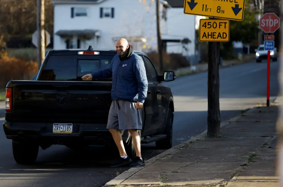 John Fetterman, the Democratic state lieutenant governor and U.S. Senate candidate, and his wife Gisele Fetterman walk outside a polling location in Braddock, during the 2022 U.S. midterm elections, in Pittsburgh, Pennsylvania, U.S., November 8, 2022. REUTERS/Quinn Glabicki USA-ELECTION/PENNSYLVANIA