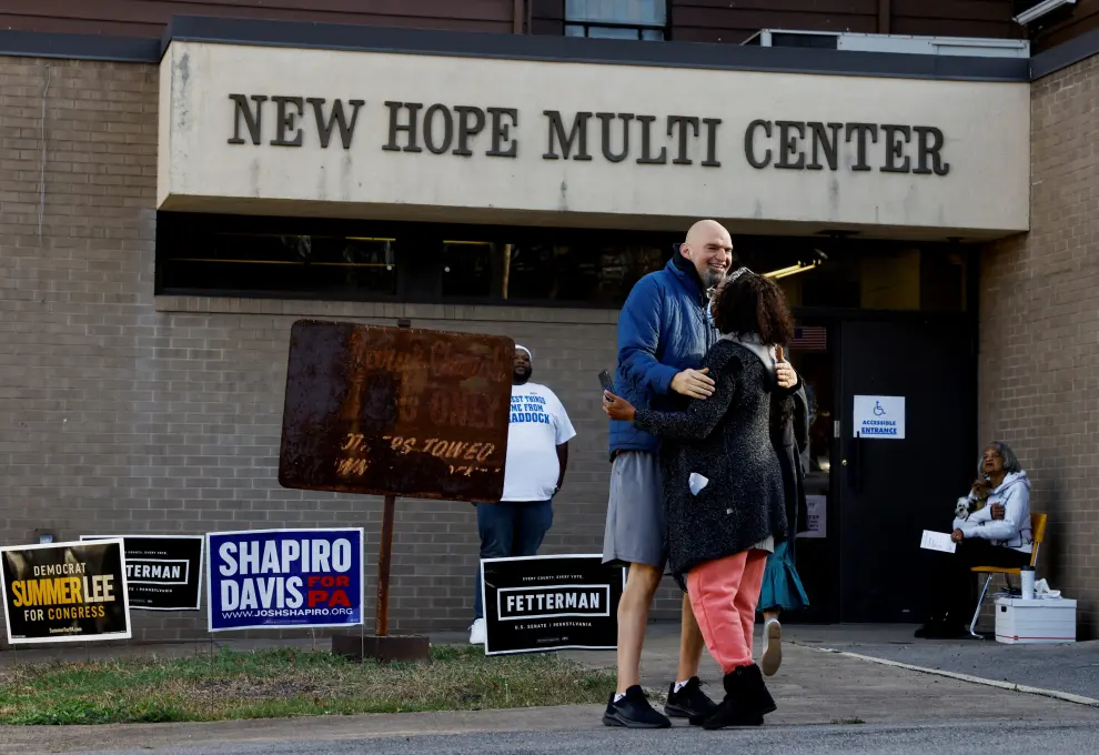 John Fetterman, the Democratic state lieutenant governor and U.S. Senate candidate, walks outside a polling location in Braddock, during the 2022 U.S. midterm elections, in Pittsburgh, Pennsylvania, U.S., November 8, 2022. REUTERS/Quinn Glabicki USA-ELECTION/PENNSYLVANIA
