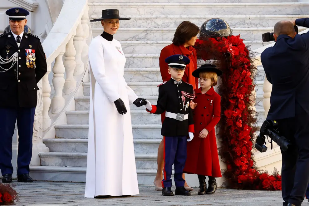 Princess Caroline of Hanover, Pierre Casiraghi and his wife Beatrice Borromeo, Stefano Casiraghi and Francesco Casiraghi, Alexandra of Hanover stand on the Palace balcony during the celebrations marking Monaco's National Day in Monaco, November 19, 2022. REUTERS/Eric Gaillard MONACO-ROYALS/