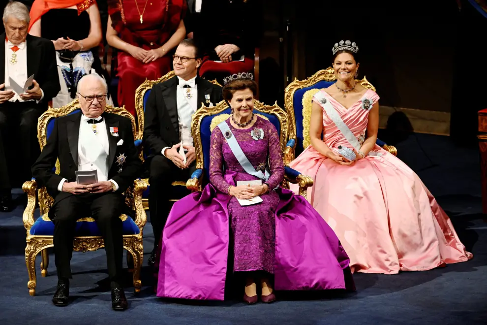 King Carl XVI Gustaf, Queen Silvia, Prince Daniel and Crown Princess Victoria of Sweden attend the Nobel Prize award ceremony at the Concert Hall in Stockholm, Sweden, December 10, 2022. TT News Agency/Christine Olsson via REUTERS      ATTENTION EDITORS - THIS IMAGE WAS PROVIDED BY A THIRD PARTY. SWEDEN OUT. NO COMMERCIAL OR EDITORIAL SALES IN SWEDEN. NOBEL-PRIZE/