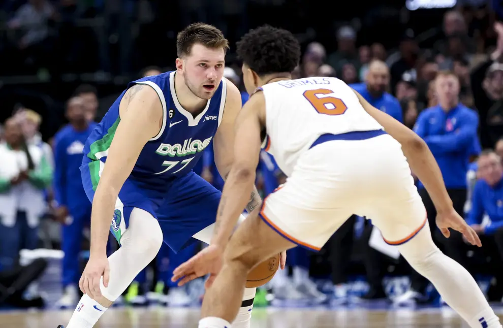 Dec 27, 2022; Dallas, Texas, USA;  Dallas Mavericks guard Luka Doncic (77) scores near the end of the fourth quarter against the New York Knicks at American Airlines Center. Mandatory Credit: Kevin Jairaj-USA TODAY Sports BASKETBALL-NBA-DAL-NYK/