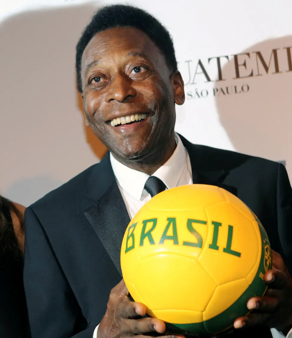 FILE PHOTO: Brazil's soccer legend Pele arrives for the amfAR Gala in Sao Paulo