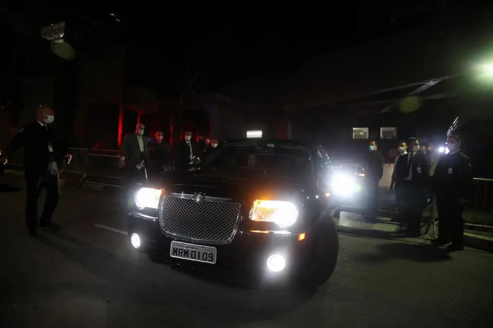 A car with the body of Brazil's soccer legend Pele leaves the hospital to be taken to Santos city for a public mass, in Sao Paulo, Brazil January 2, 2023. REUTERS/Carla Carniel SOCCER-PELE/