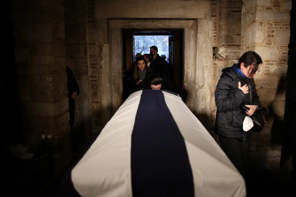 A man pays his respects to former King of Greece Constantine II at Saint Eleftherios chapel, where he lies at rest before the funeral service, in Athens, Greece, January 16, 2023. REUTERS/Alkis Konstantinidis GREECE-ROYALS/KING-FUNERAL
