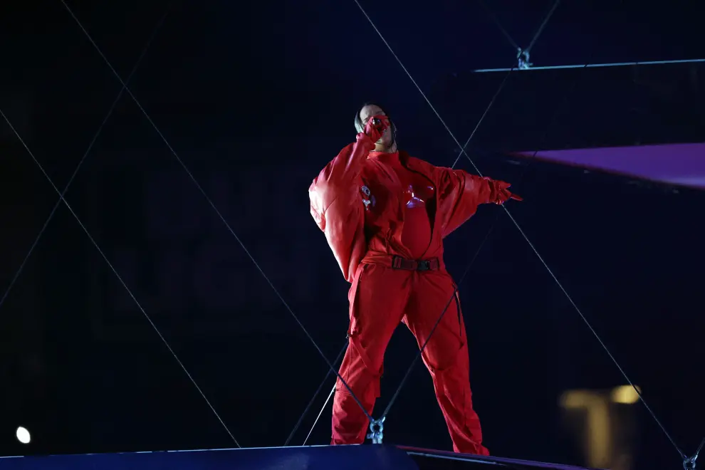 Feb 12, 2023; Glendale, Arizona, US; Recordist artist Rihanna performs during the halftime show of Super Bowl LVII at State Farm Stadium. Mandatory Credit: Mark J. Rebilas-USA TODAY Sports FOOTBALL-NFL/