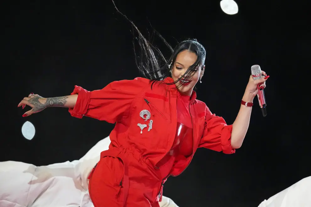 Feb 12, 2023; Glendale, Arizona, US; Recordist artist Rihanna performs during the halftime show of Super Bowl LVII at State Farm Stadium. Mandatory Credit: Kirby Lee-USA TODAY Sports FOOTBALL-NFL/