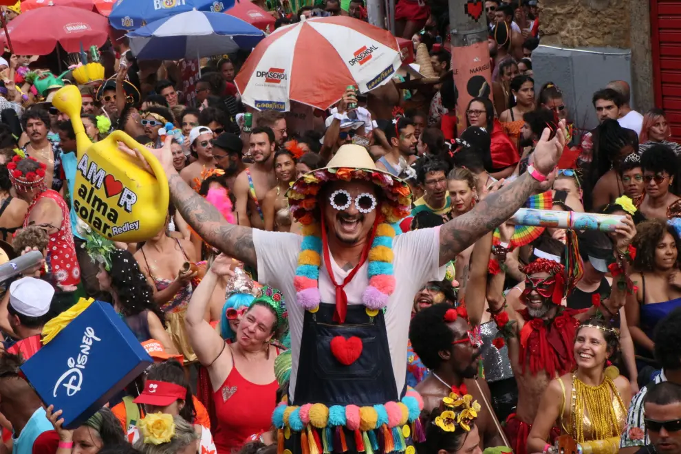 A child attends the annual block party known as "Cordao de Prata Preta", during Carnival festivities in Rio de Janeiro, Brazil February 18, 2023. REUTERS/Pilar Olivares BRAZIL-CARNIVAL/STREET