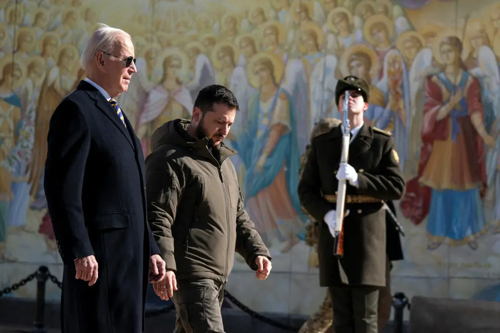 U.S. President Joe Biden walks with Ukrainian President Volodymyr Zelenskiy at St. Michael's Golden-Domed Cathedral during an unannounced visit, in Kyiv, Ukraine, Monday, Feb. 20, 2023. Evan Vucci/Pool via REUTERS UKRAINE-CRISIS/BIDEN
