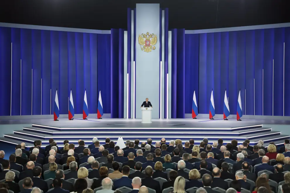 Russian President Vladimir Putin is seen on a screen during his annual address to the Federal Assembly, in Sevastopol, Crimea February 21, 2023. REUTERS/Alexey Pavlishak UKRAINE-CRISIS/ANNIVERSARY-PUTIN-CRIMEA