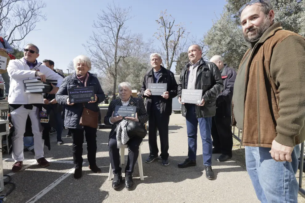 Los representantes de los barrios de Zaragoza leen el manifiesto reivindicativo durante la celebración de la Cincomarzada.