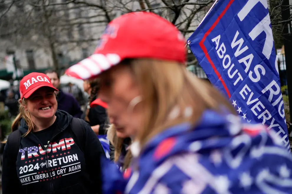 Supporters of former President Donald Trump demonstrate outside Manhattan Criminal Courthouse, on the day of Trump's planned court appearance after his indictment by a Manhattan grand jury following a probe into hush money paid to porn star Stormy Daniels, in New York City, U.S., April 4, 2023. REUTERS/Eduardo Munoz USA-TRUMP/