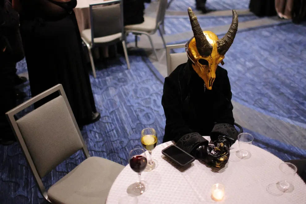 Attendees gather at the Satanic Ball during the Satanic Temple's Satancon 2023, which they call an "in-person conference for congregations, campaigns, members, and supporters," in Boston, Massachusetts, U.S., April 28, 2023.  The Satanic Temple describes itself as "the primary religious Satanic organization in the world." REUTERS/Brian Snyder USA-DAILYLIFE/