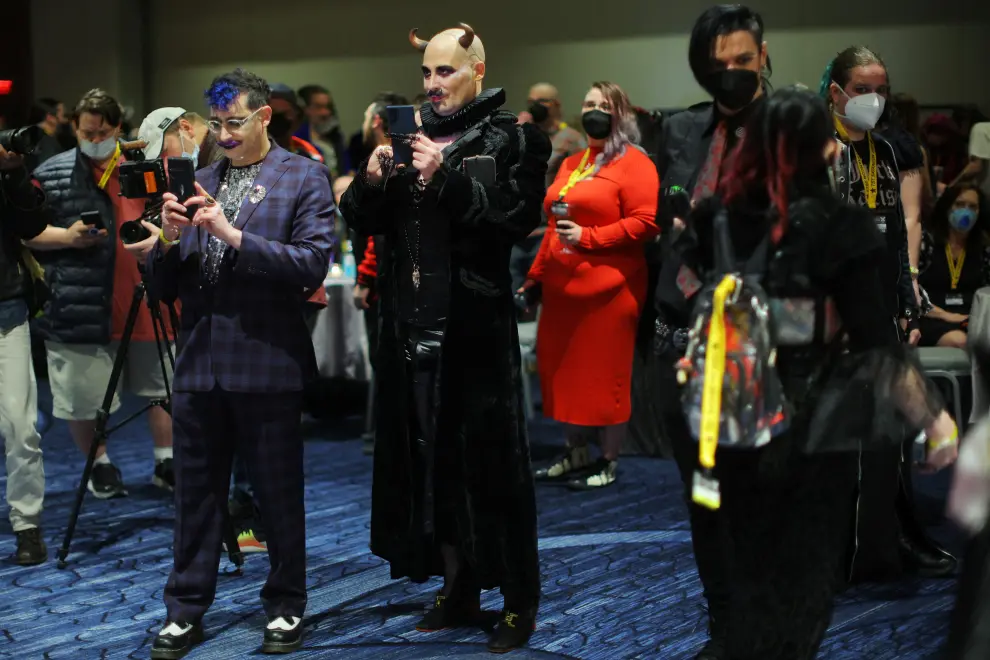 An attendee poses for a photograph at the Satanic Ball during the Satanic Temple's Satancon 2023, which they call an "in-person conference for congregations, campaigns, members, and supporters," in Boston, Massachusetts, U.S., April 28, 2023. The Satanic Temple describes itself as "the primary religious Satanic organization in the world." REUTERS/Brian Snyder USA-DAILYLIFE/