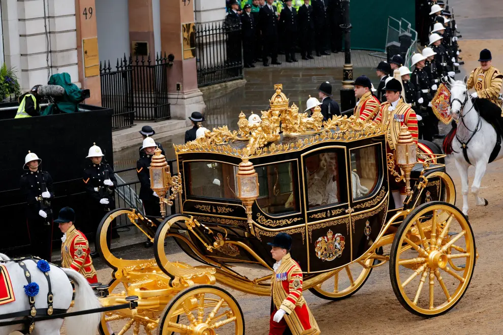 Britian's Prince, Duke of Edinburgh, Sophie, Duchess of Edinburgh and their daughter Lady Louise Windsor ride in a car in Westminster on the day of Britain's King Charles' coronation in London, Britain May 6, 2023. REUTERS/Marko Djurica BRITAIN-ROYALS/CORONATION