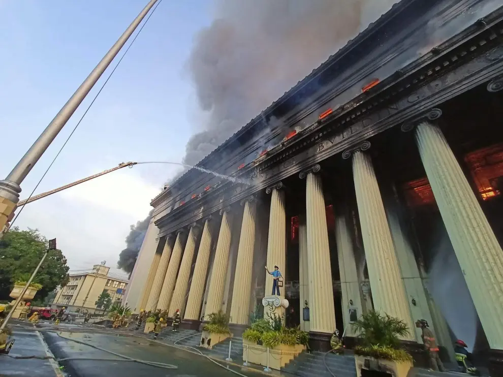Smoke erupts as a massive fire hits Manila Central Post Office building in Manila, Philippines, May 22, 2023 in this screengrab taken from a handout video. AJ Acosta - Manila Public Information Office/Handout via REUTERS    THIS IMAGE HAS BEEN SUPPLIED BY A THIRD PARTY. MANDATORY CREDIT. PHILIPPINES-FIRE/