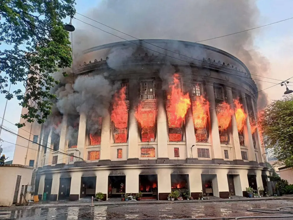 Smoke erupts as a massive fire hits Manila Central Post Office building in Manila, Philippines, May 22, 2023. Bureau Of Fire Protection NCR/Handout via REUTERS THIS IMAGE HAS BEEN SUPPLIED BY A THIRD PARTY. MANDATORY CREDIT. NO RESALES. NO ARCHIVES. PHILIPPINES-FIRE/