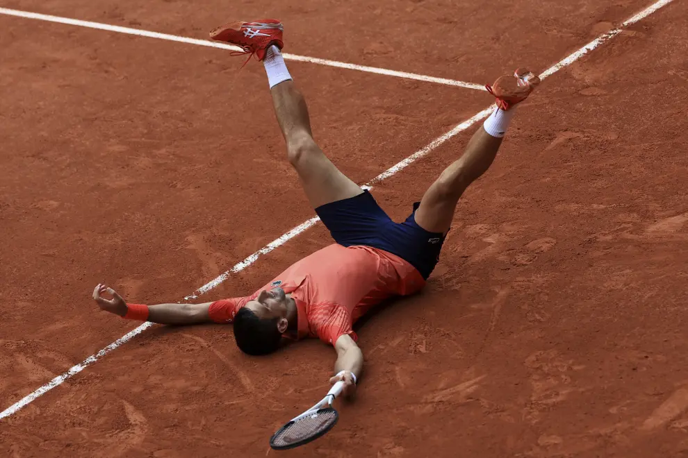 Serbia's Novak Djokovic reacts after winning the men's singles final match of the French Open tennis tournament against Norway's Casper Ruud in three sets, 7-6, (7-1), 6-3, 7-5, at the Roland Garros stadium in Paris, Sunday, June 11, 2023. Djokovic won his record 23rd Grand Slam singles title, breaking a tie with Rafael Nadal for the most by a man. (AP Photo/Aurelien Morissard)