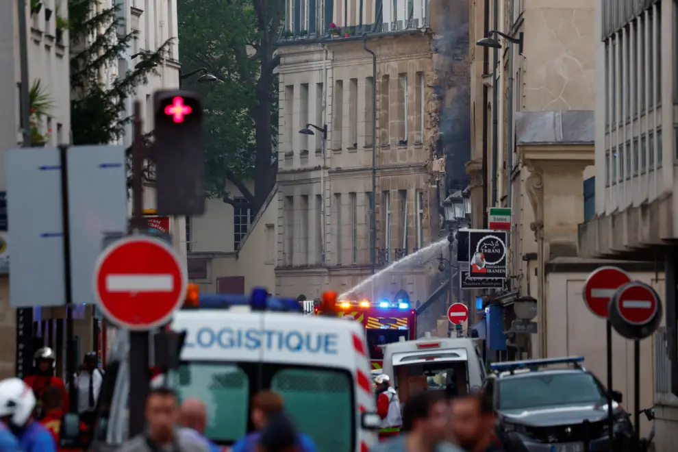 French firefighters and rescue forces work after several buildings on fire following a gas explosion in the fifth arrondissement of Paris, France, June 21, 2023. REUTERS/Gonzalo Fuentes